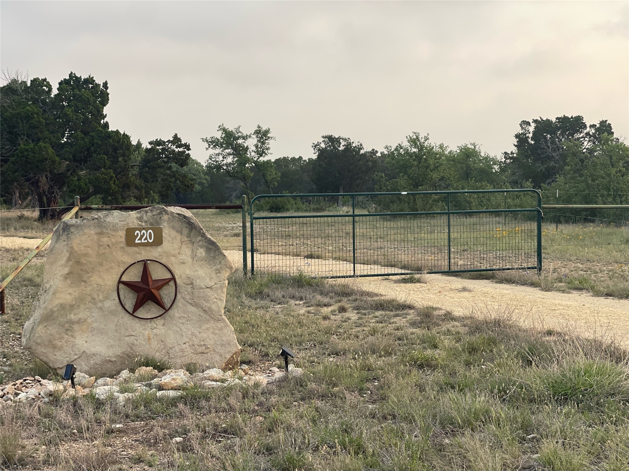 220 Rattlesnake Road Northwest Junction, TX 76849 - Photo 4 of 38 a view of outdoor space with flat screen tv