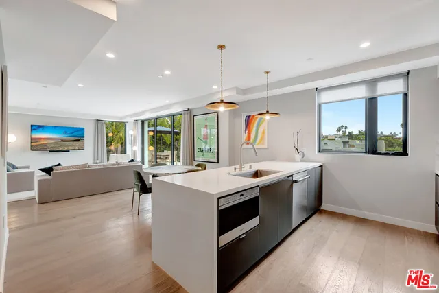 a kitchen with a stove and a sink