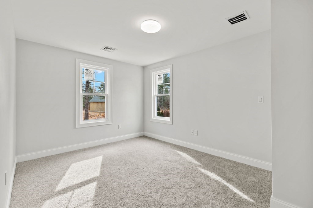 180 Barker Road East Wareham, MA 02538 - Photo 16 of 29 an empty room with windows