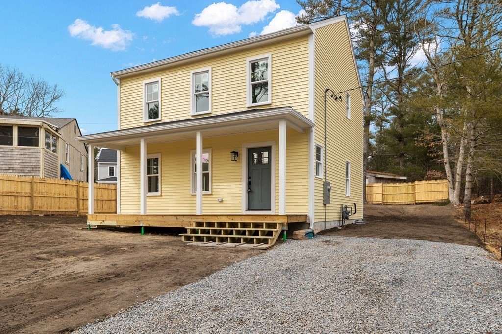 180 Barker Road East Wareham, MA 02538 - Photo 2 of 29 a front view of a house with a yard