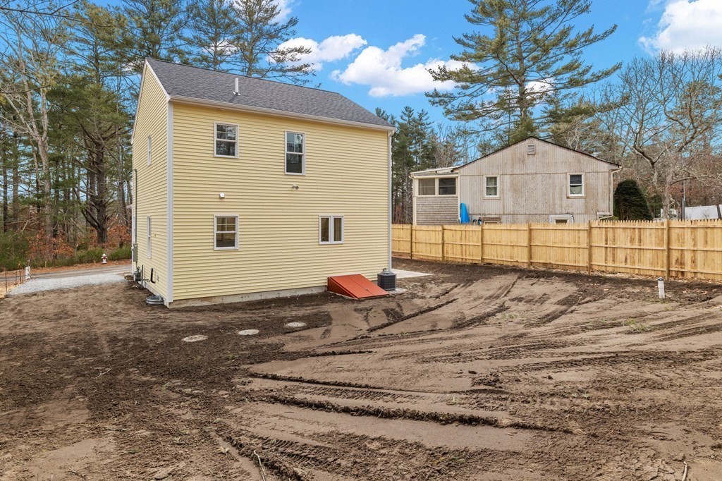 180 Barker Road East Wareham, MA 02538 - Photo 4 of 29 a view of a house with a yard