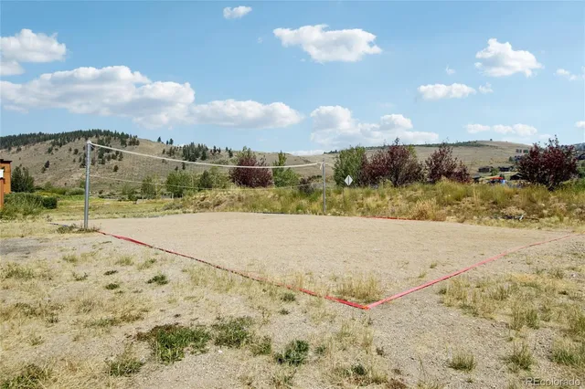 a view of a terrace with wooden benches
