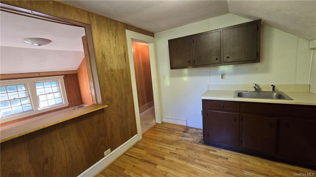 17 Old Mill Road Poughkeepsie, NY 12603 - Photo 19 of 23 a room with a sink and a mirror