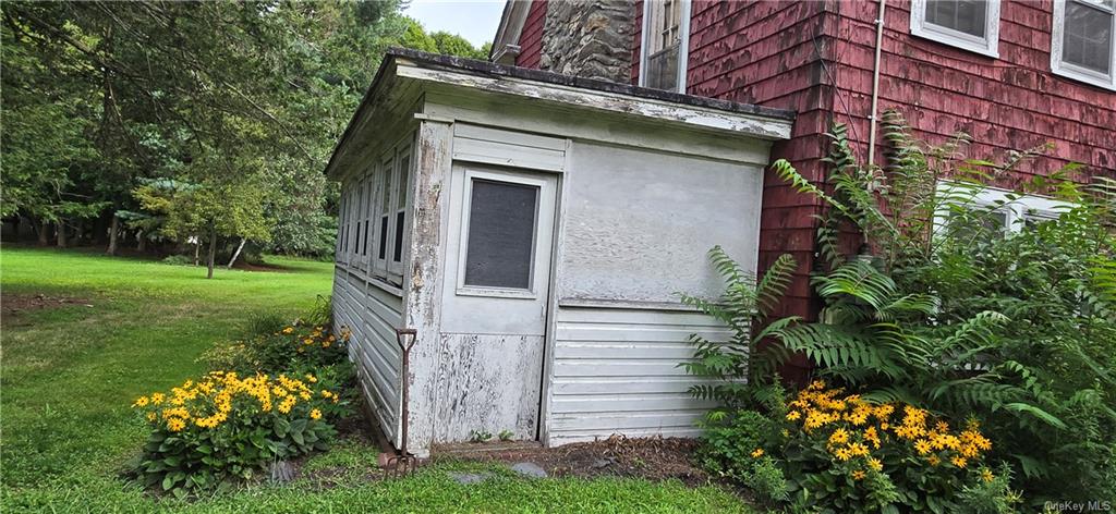 17 Old Mill Road Poughkeepsie, NY 12603 - Photo 2 of 23 a front view of a house with garden