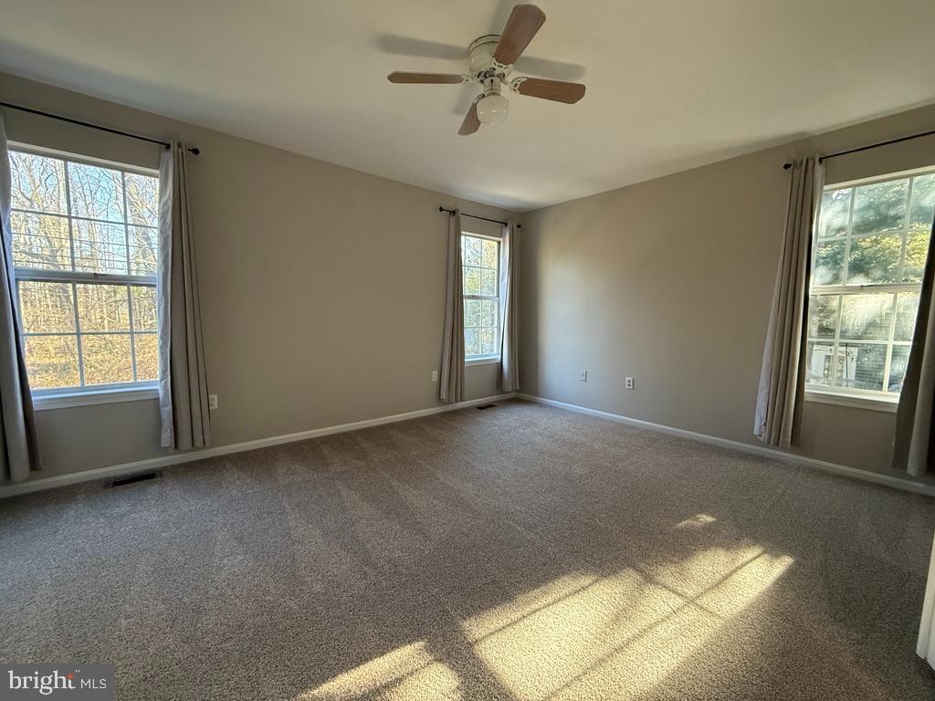 937 Breakwater Drive Annapolis, MD 21403 - Photo 18 of 27 a view of an empty room with a window