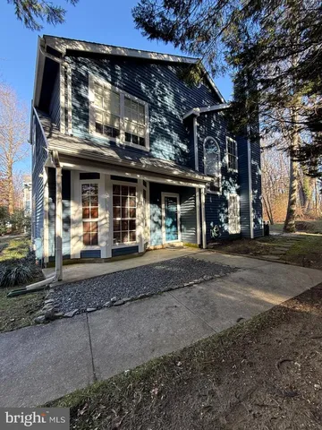 a view of a house with a porch