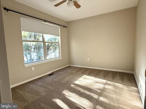 937 Breakwater Drive Annapolis, MD 21403 - Photo 23 of 27 a view of an empty room with a window