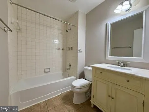 a view of hall way with furniture