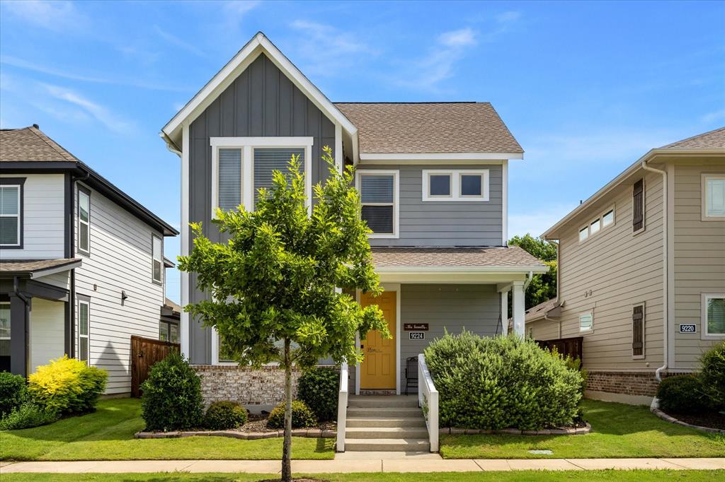 9224 Lamar Street Rowlett, TX 75089 - Photo 1 of 27 Two-story residence featuring a gabled roofline and a vibrant yellow front door