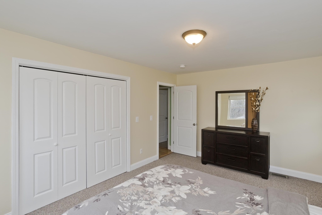 48 Mountain Avenue West Springfield, MA 01089 - Photo 24 of 39 a bedroom with a bed and a dresser