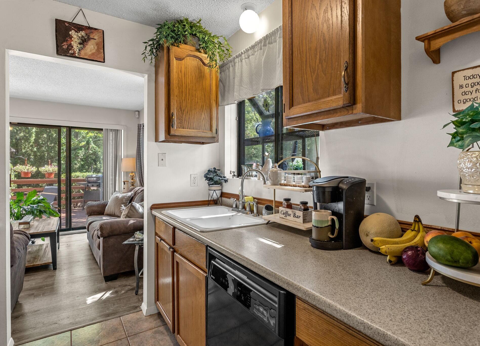 20 Round House Road, Unit 20 Bourne, MA 02532 - Photo 13 of 32 kitchen to living room