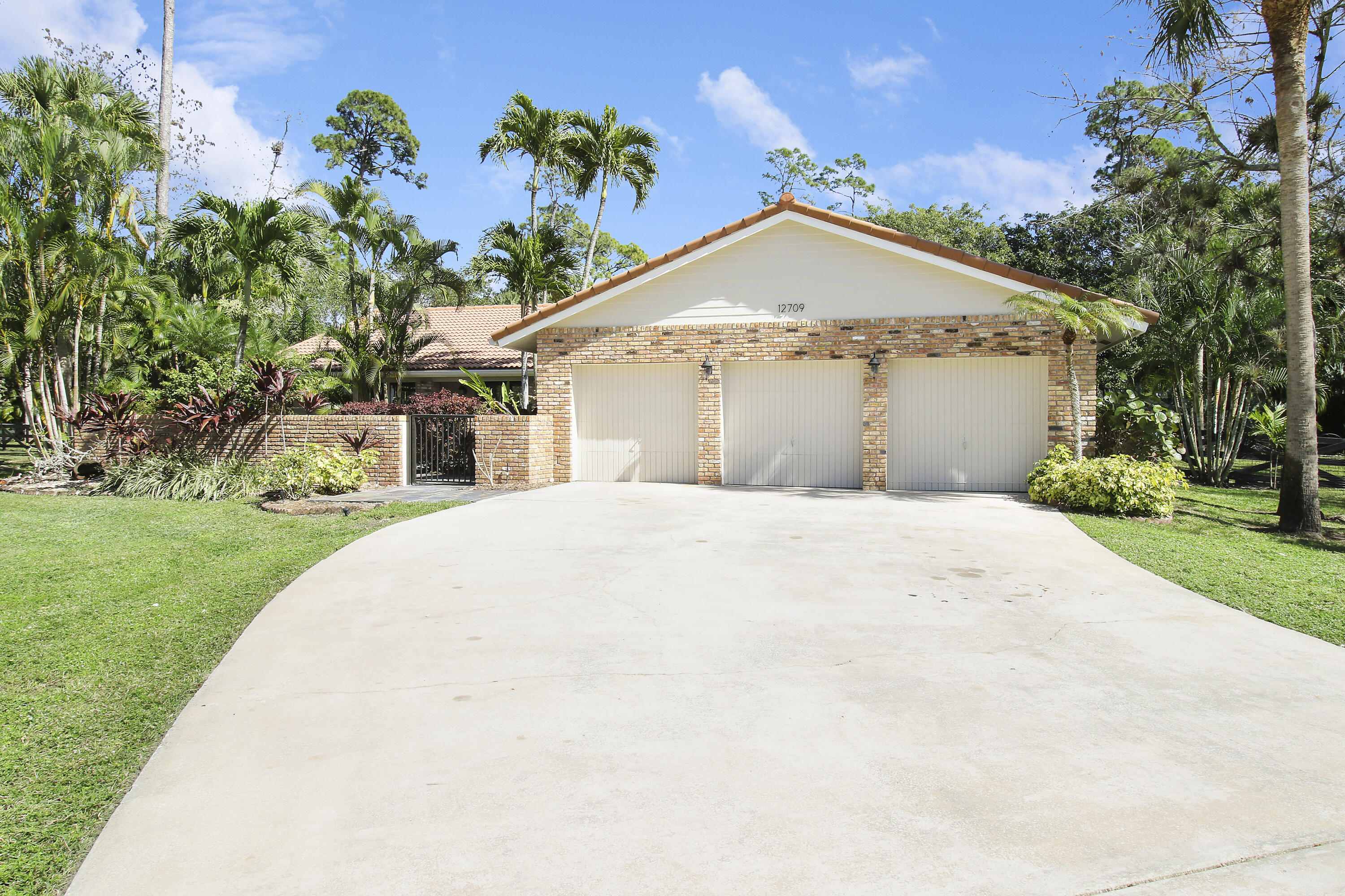 12709 Quercus Lane Wellington, FL 33414 - Photo 1 of 31 IF2A8586