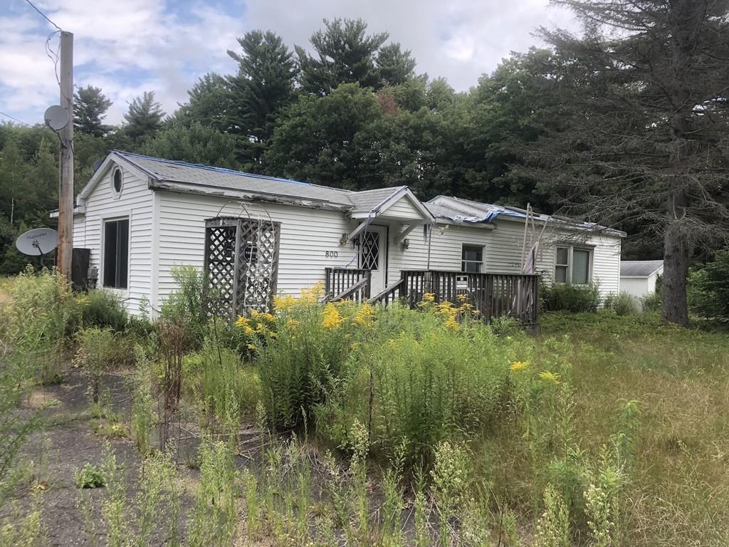 800 Washburn Road Barre, MA 01005 - Photo 1 of 15 a view of a house with a yard and plants