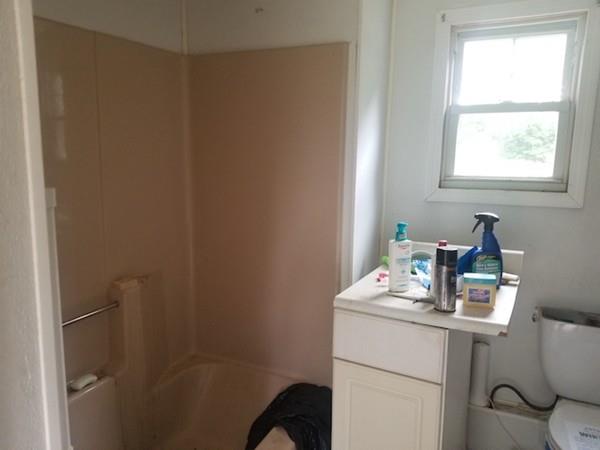 800 Washburn Road Barre, MA 01005 - Photo 13 of 15 a bathroom with a sink toilet and a window