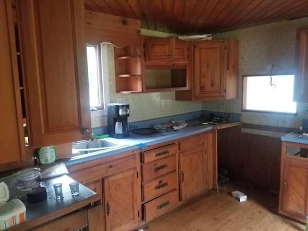800 Washburn Road Barre, MA 01005 - Photo 14 of 15 a kitchen with stainless steel appliances granite countertop a sink stove and cabinets