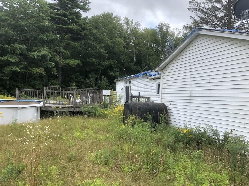 800 Washburn Road Barre, MA 01005 - Photo 8 of 15 a backyard of a house with yard and lake view