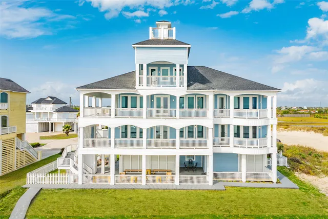 a front view of a building with a swimming pool