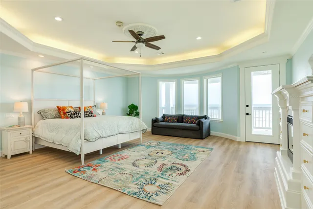 a bedroom with a bed and a couch