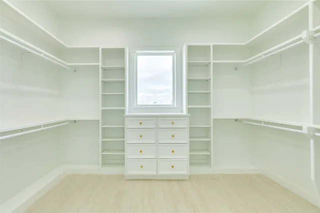 a view of an empty walk in closet