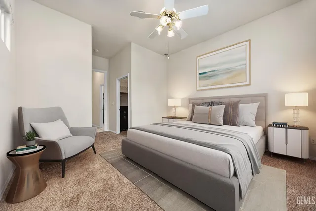 a view of empty room with wooden floor and fireplace