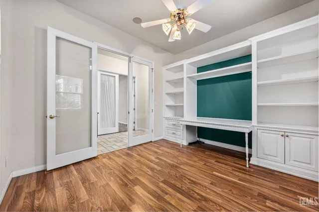 a bath room with a sink and a mirror