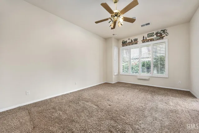 a bath tub sitting next to a window