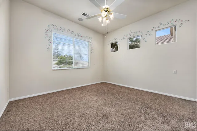 a utility room with sink dryer and washer