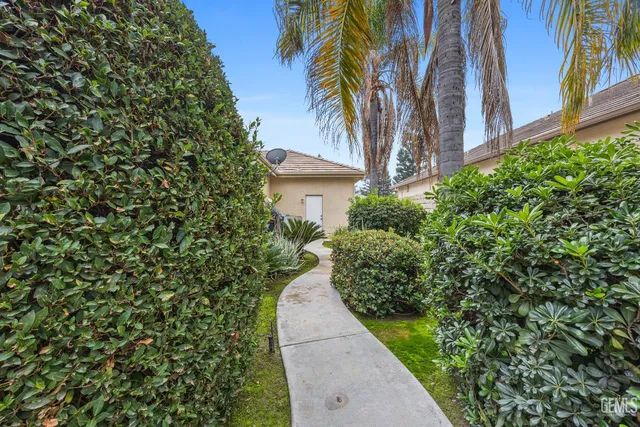 a view of a livingroom with workspace and a window