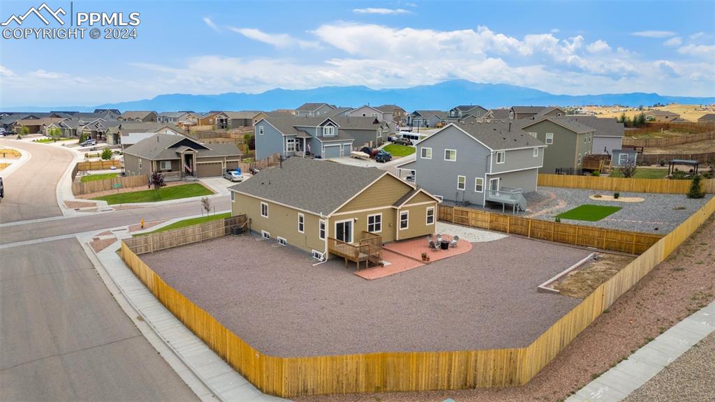 10110 Henman Terrace Peyton, CO 80831 - Photo 36 of 36 an aerial view of residential houses with a swimming pool