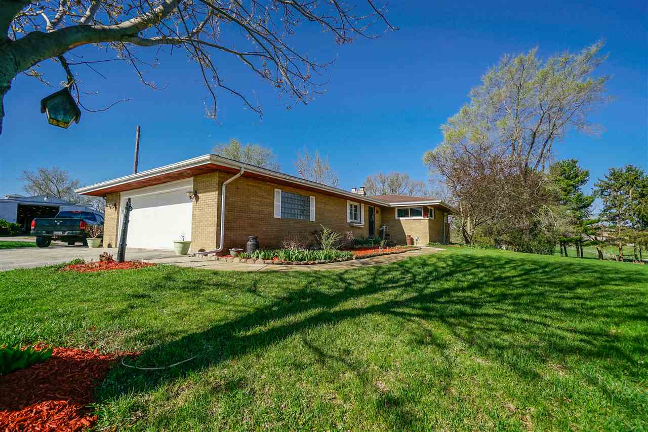14588 Freeport Road Durand, IL 61024 - Photo 2 of 25 a view of a house with backyard