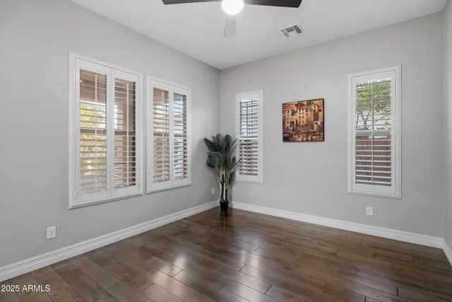 a spacious bathroom with a shower and a sink