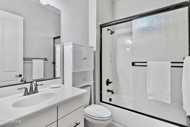 a view of a backyard with a tub