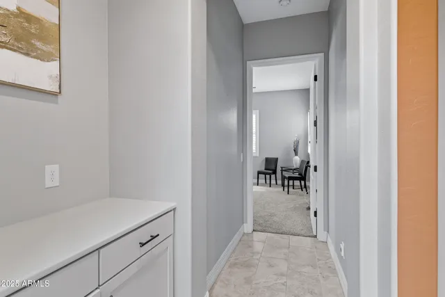 a reading room with furniture and a yard