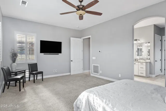 an aerial view of residential houses with outdoor space and street view
