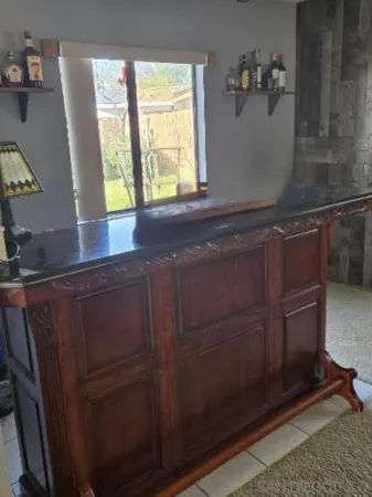 a kitchen with a sink and a window