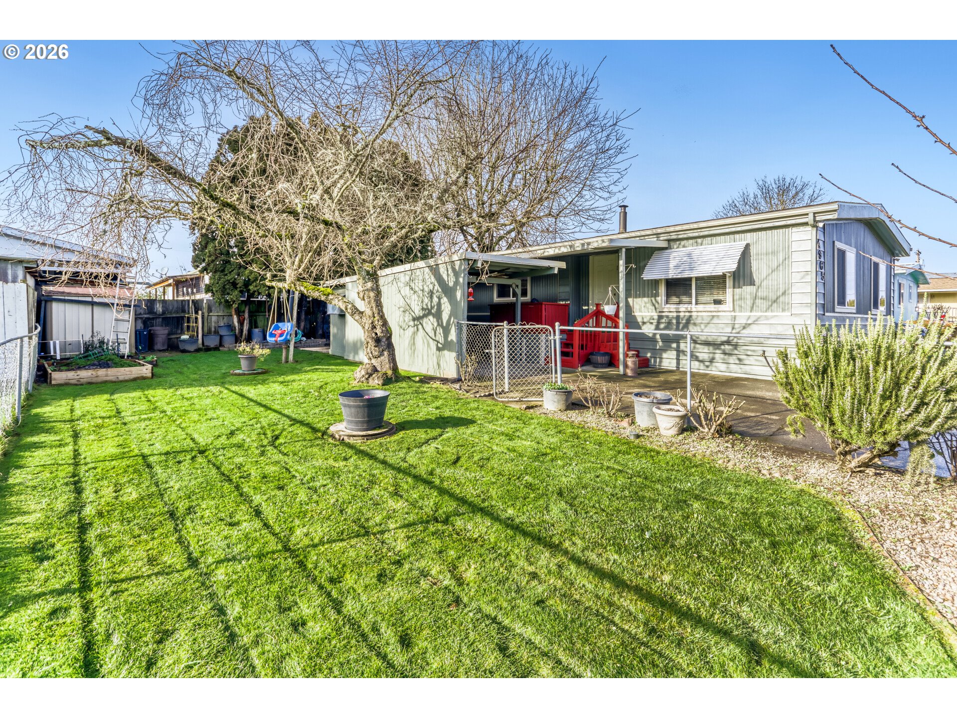 4965 Southwest Westview Drive, Unit 15 Cornelius, OR 97113 - Photo 25 of 29 a view of a backyard with a small garden
