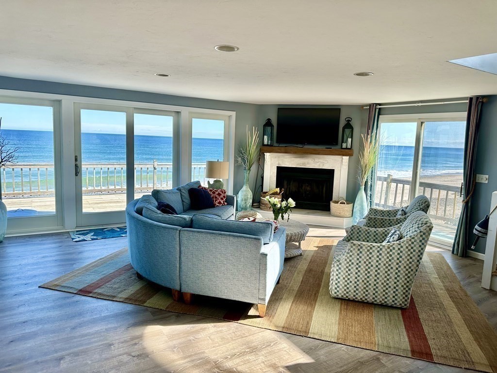 230 Central Avenue Scituate, MA 02050 - Photo 15 of 34 a living room with furniture and a fireplace