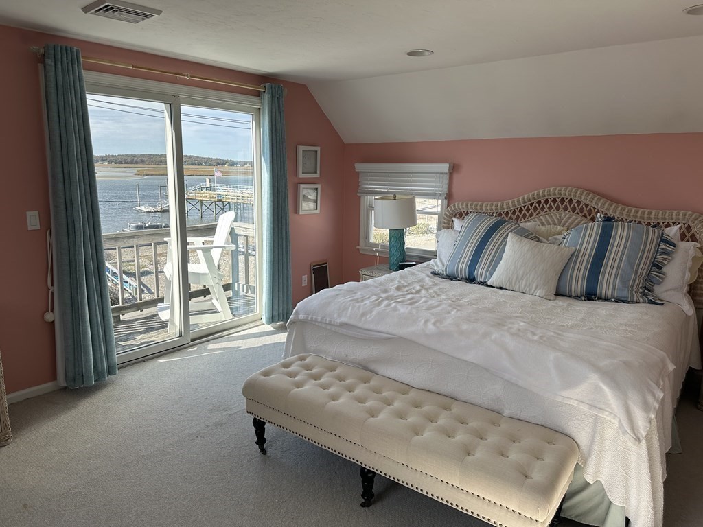 230 Central Avenue Scituate, MA 02050 - Photo 24 of 34 a spacious bedroom with a bed and large window