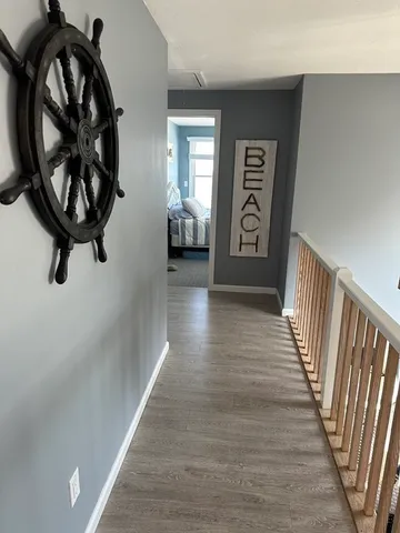 an aerial view of a house with a ocean view