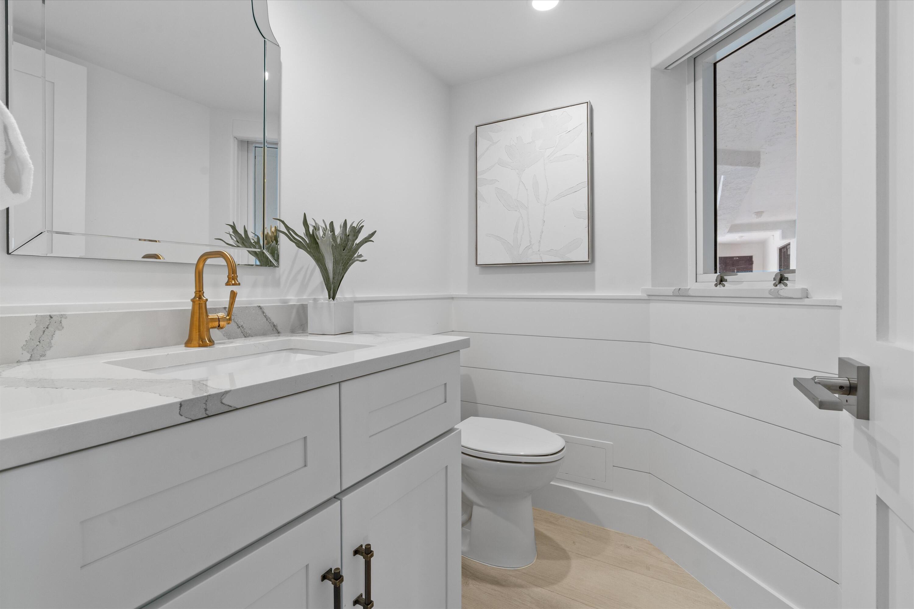 2575 South Ocean Boulevard, Unit 102S Highland Beach, FL 33487 - Photo 25 of 31 Half Bathroom