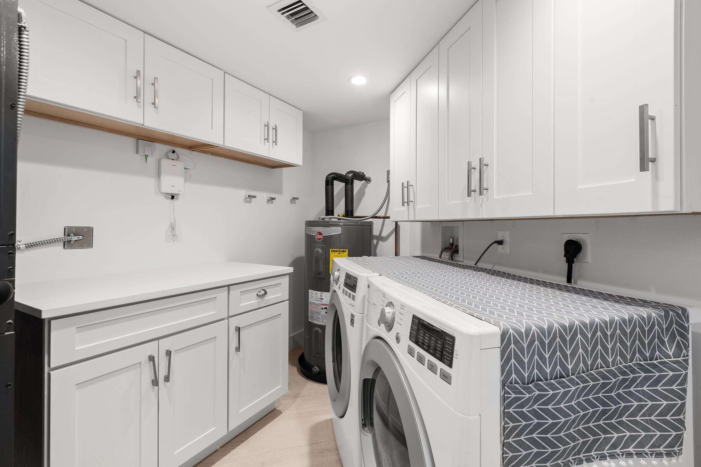 2575 South Ocean Boulevard, Unit 102S Highland Beach, FL 33487 - Photo 26 of 31 Laundry Room