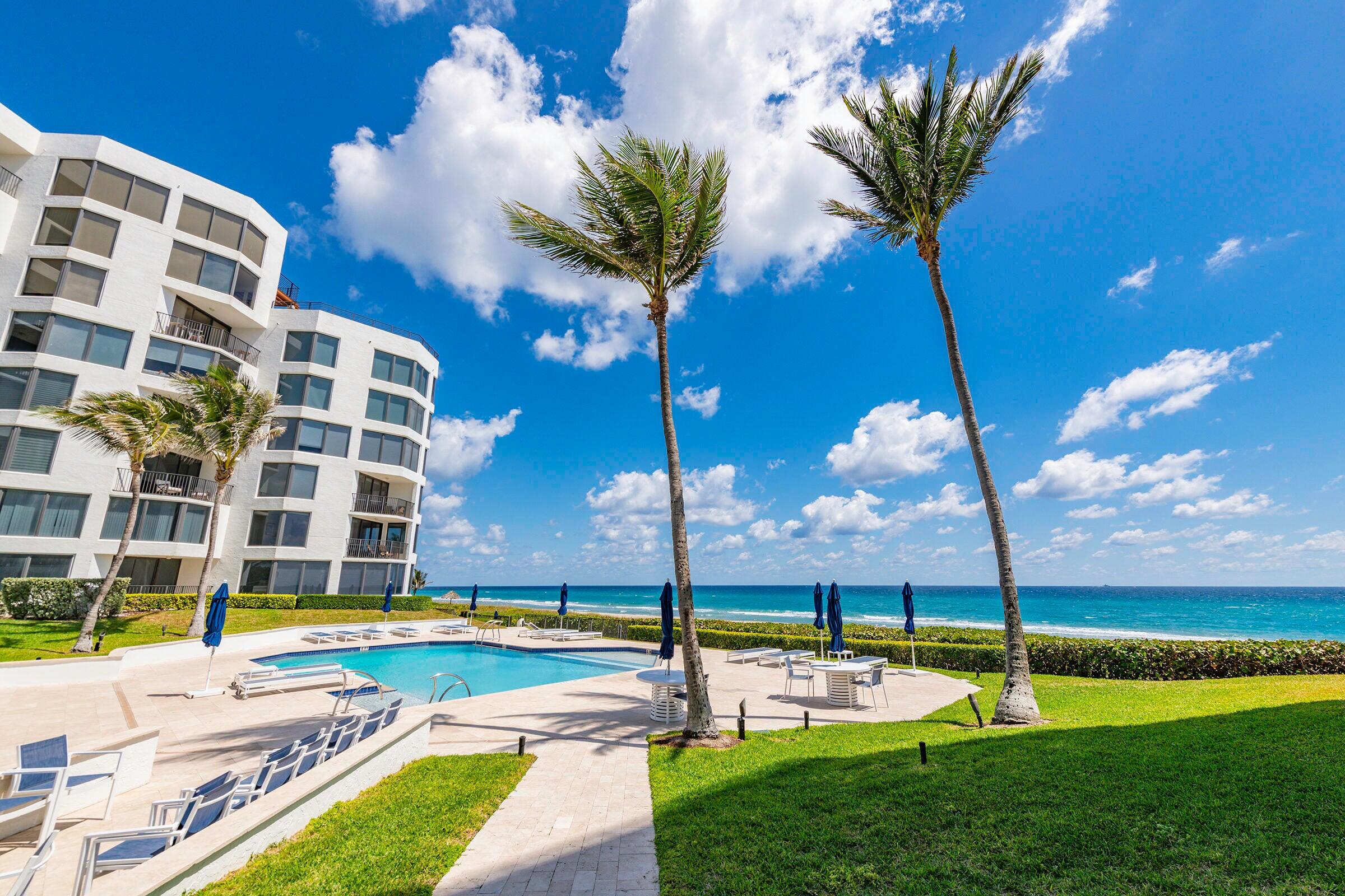2575 South Ocean Boulevard, Unit 102S Highland Beach, FL 33487 - Photo 28 of 31 pool ground view