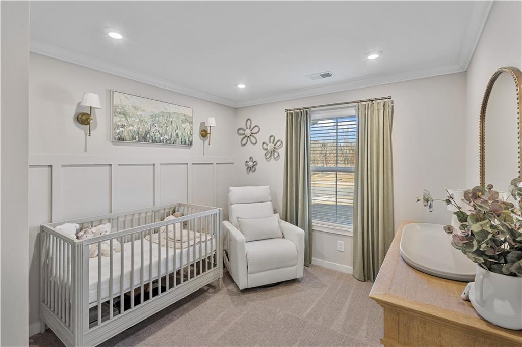 257 Traminer Way Braselton, GA 30517 - Photo 13 of 40 a bedroom with furniture and a bed