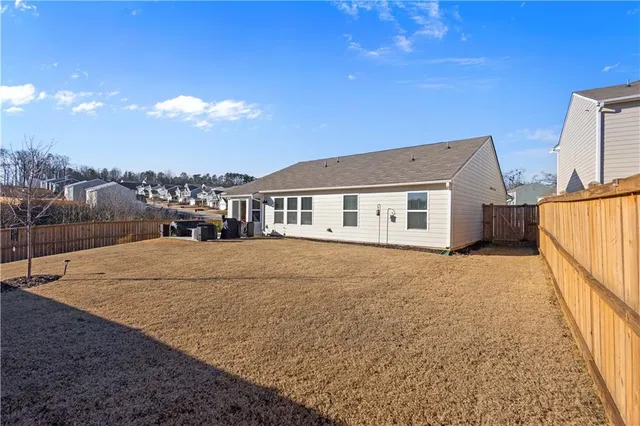 a house with yard in front of it