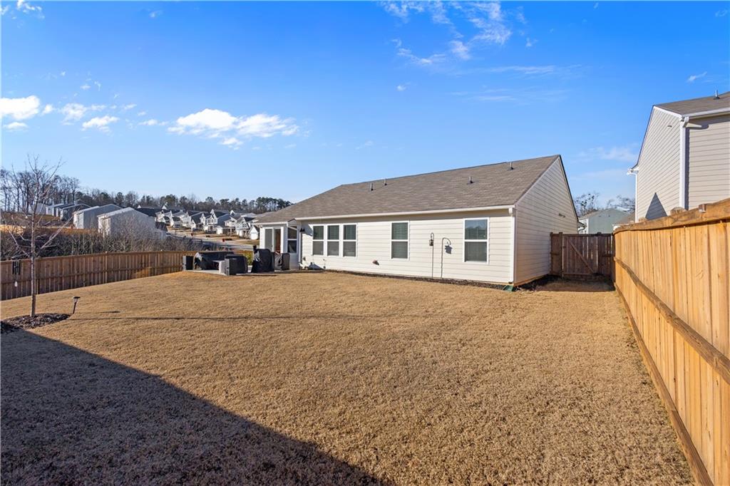 257 Traminer Way Braselton, GA 30517 - Photo 3 of 40 a house with yard in front of it