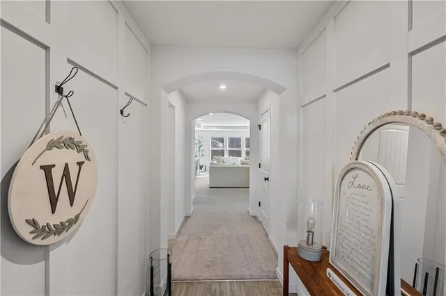 a view of a livingroom with furniture and front door