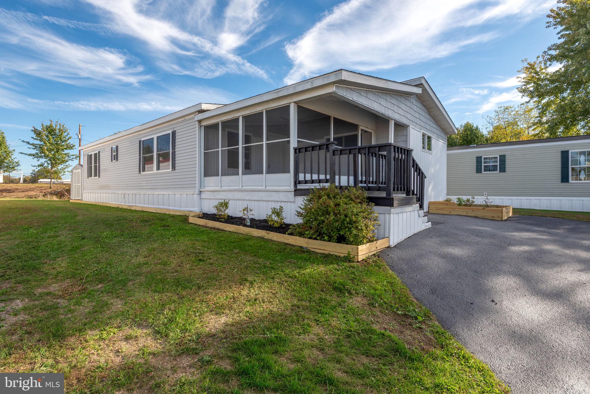 358 Pegram Street Gettysburg, PA 17325 - Photo 1 of 25 a front view of a house with a yard