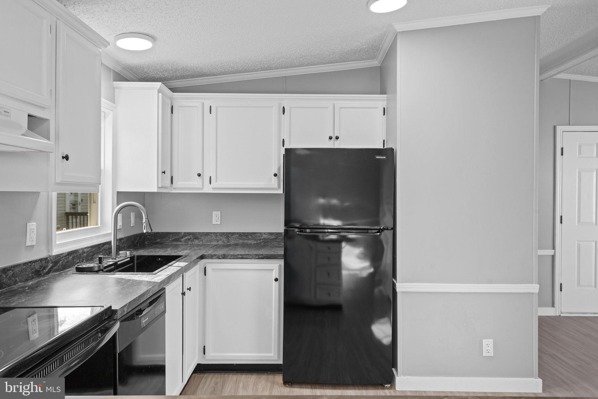 358 Pegram Street Gettysburg, PA 17325 - Photo 11 of 25 a kitchen with a refrigerator and a sink