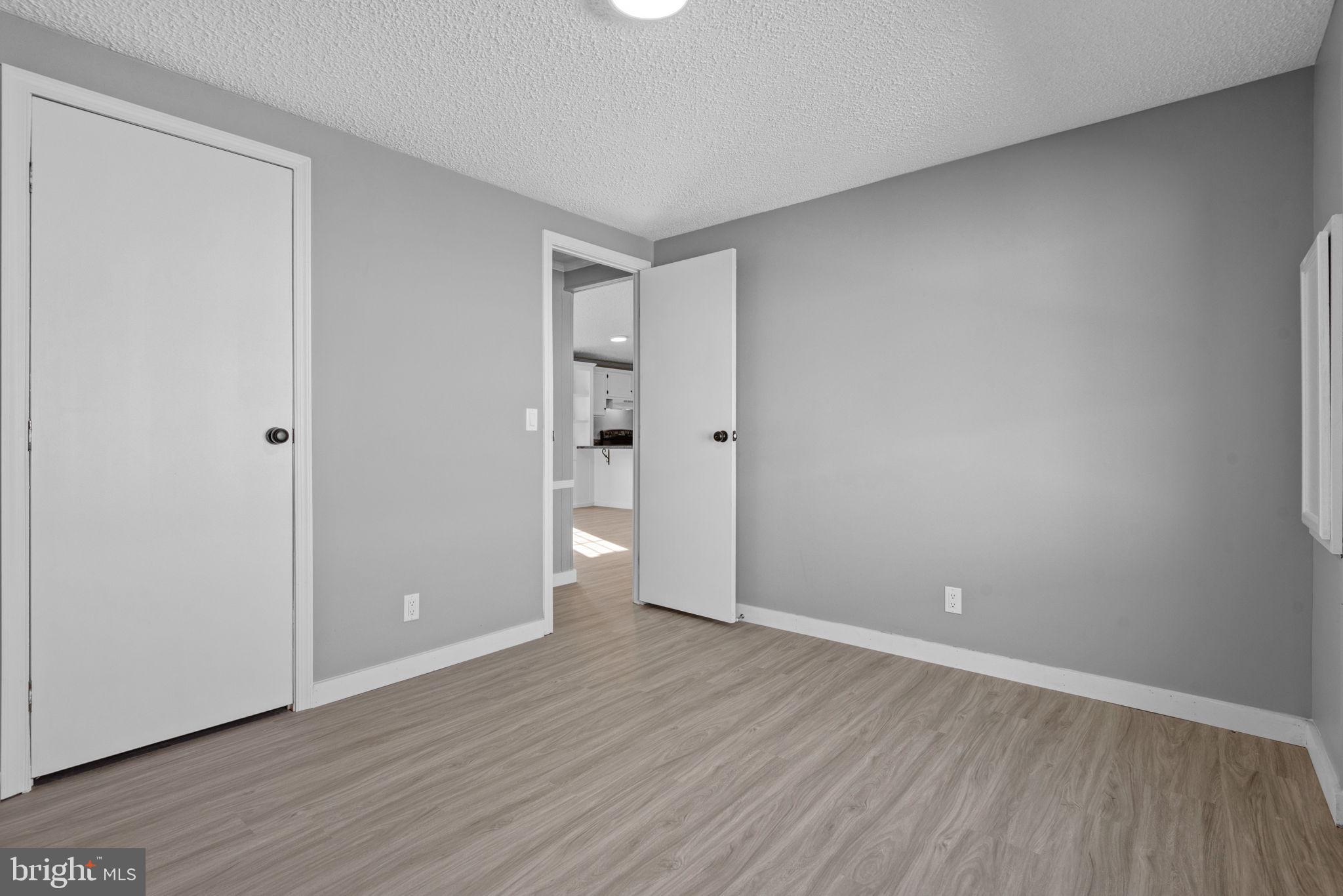 358 Pegram Street Gettysburg, PA 17325 - Photo 19 of 25 a view of an empty room with wooden floor