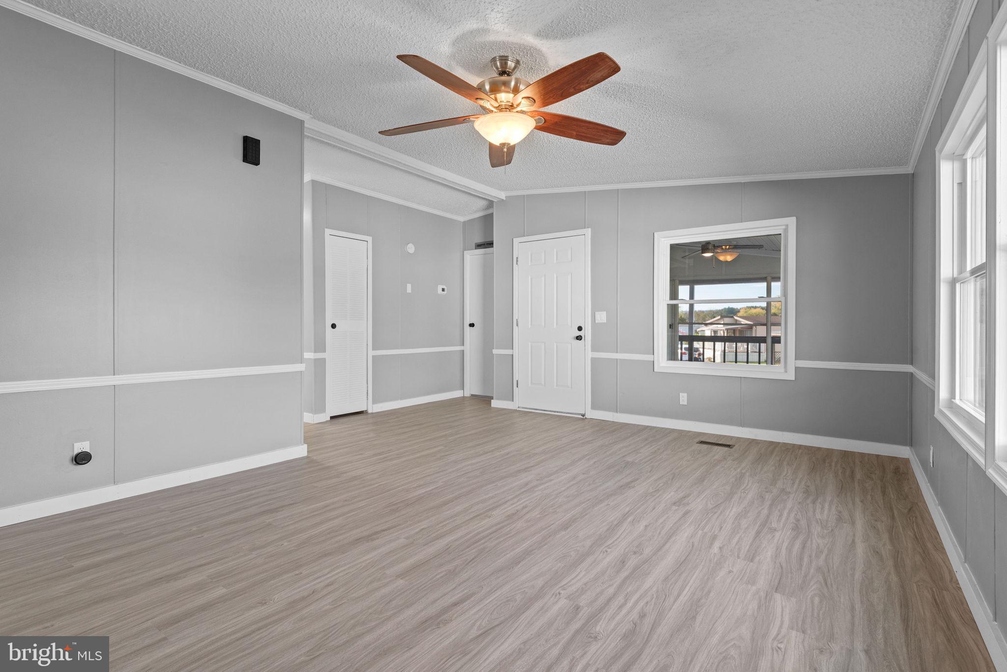 358 Pegram Street Gettysburg, PA 17325 - Photo 6 of 25 wooden floor in an empty room with a window